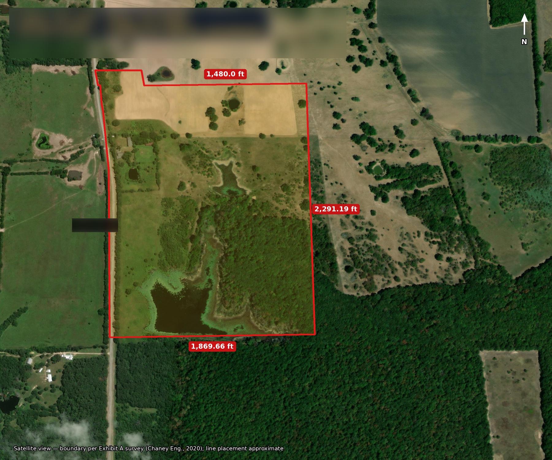 Satellite view of the land parcel with the red surveyed boundary line